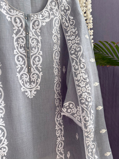 Luxurious Mul chanderi appliqué work suit