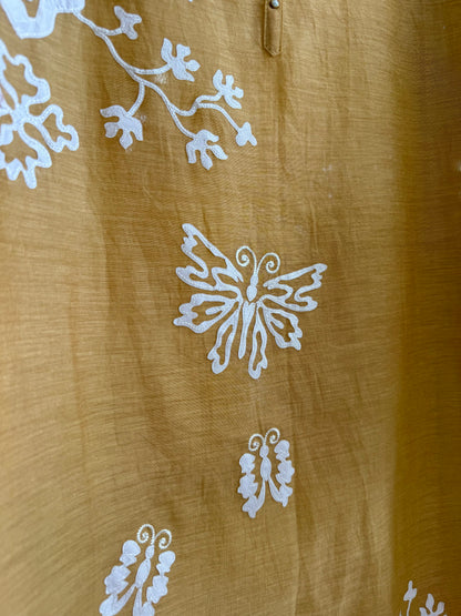 Luxurious Mul chanderi appliqué butterfly suit