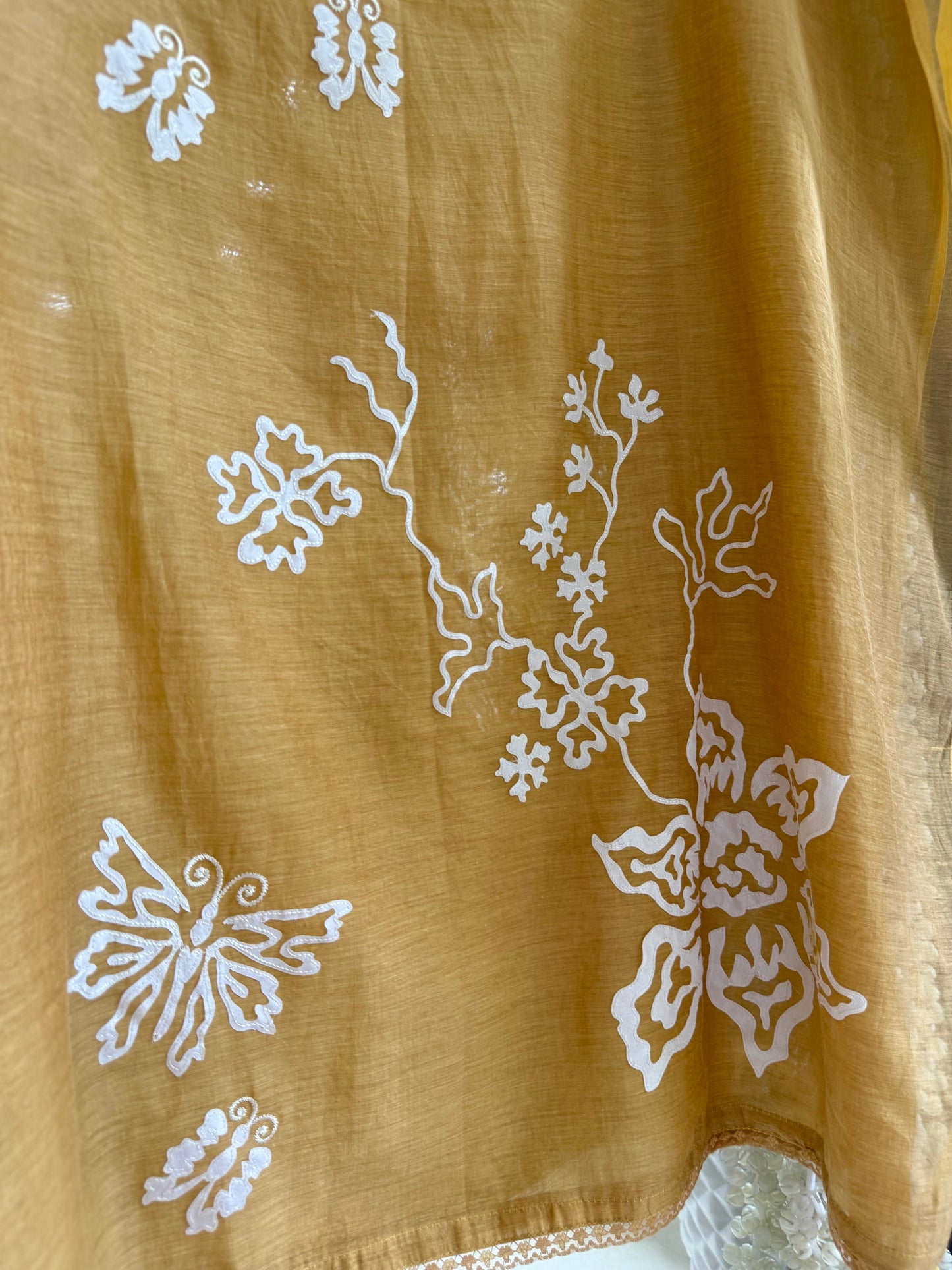 Luxurious Mul chanderi appliqué butterfly suit