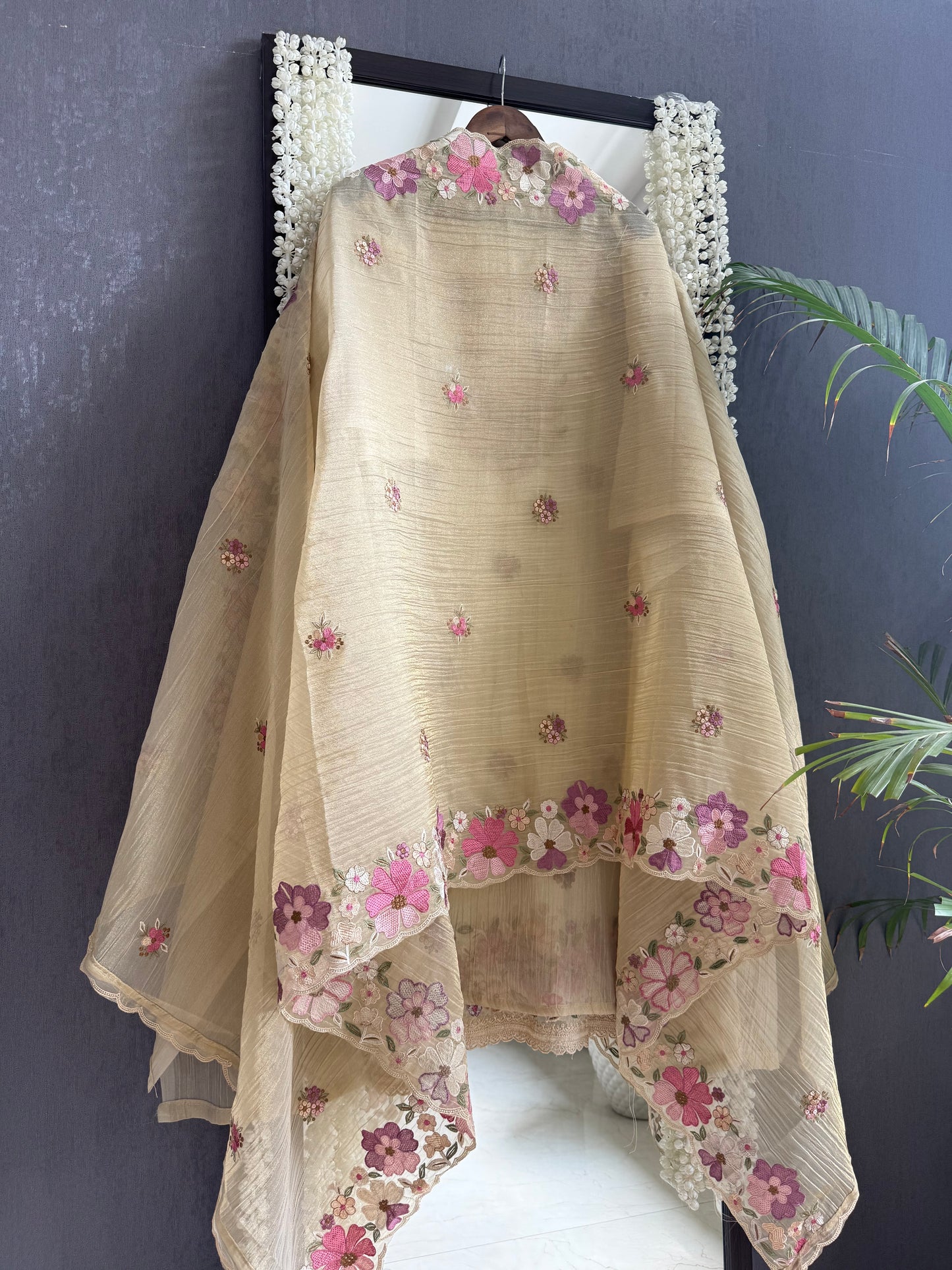 Luxurious Mul chanderi appliqué work floral suit