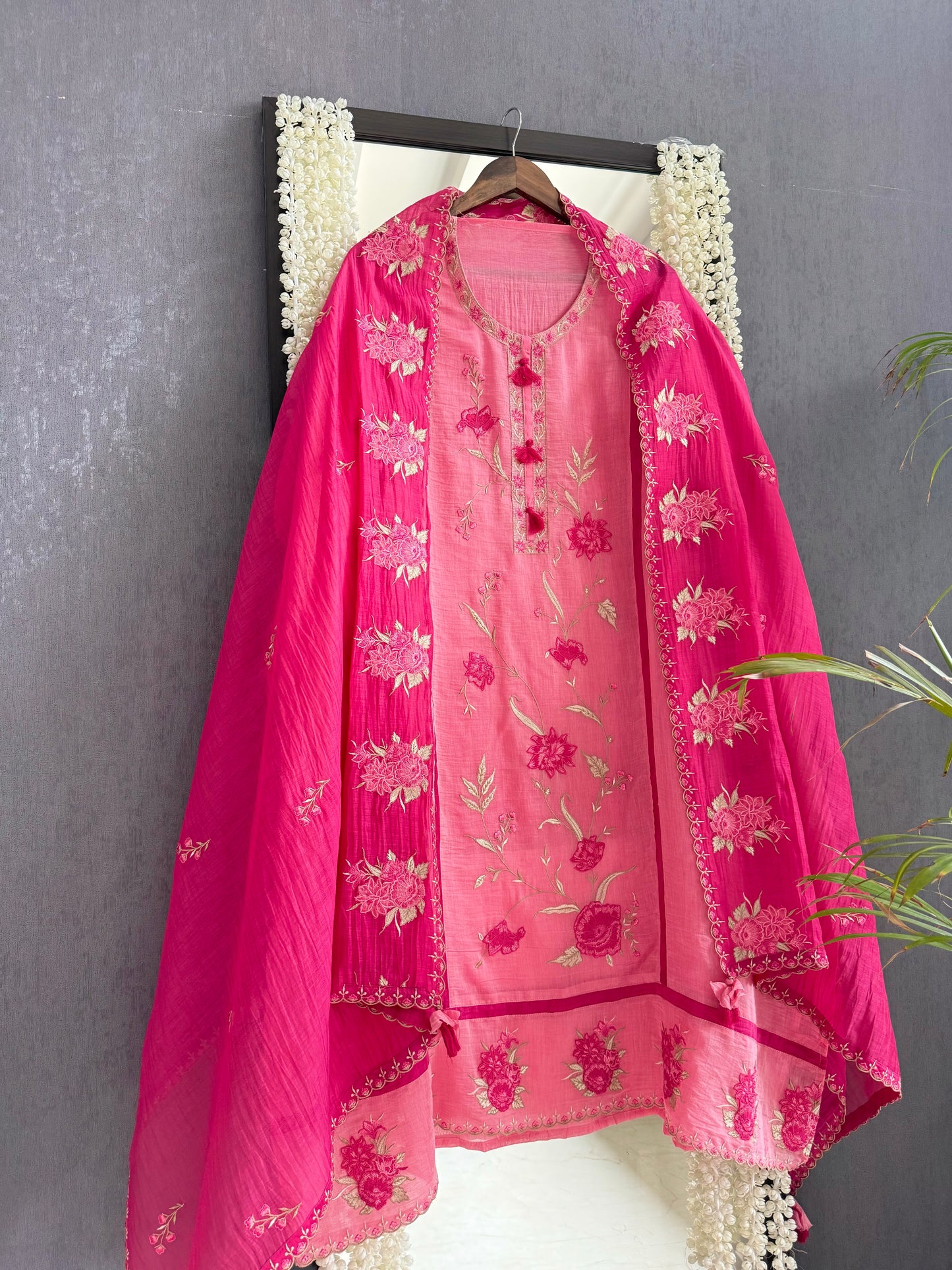 Luxurious Mul chanderi appliqué floral suit