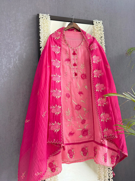 Luxurious Mul chanderi appliqué floral suit