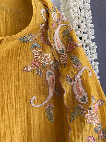 Luxurious Mul chanderi threadwork schiffili suit