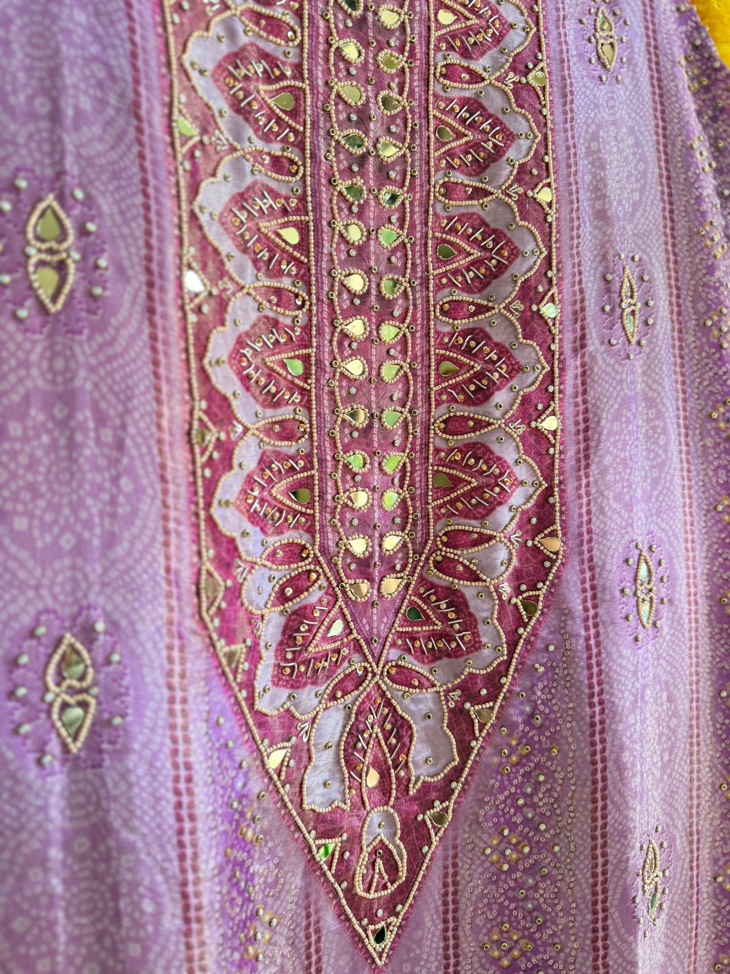 Luxurious bandhani hearts kundan suit