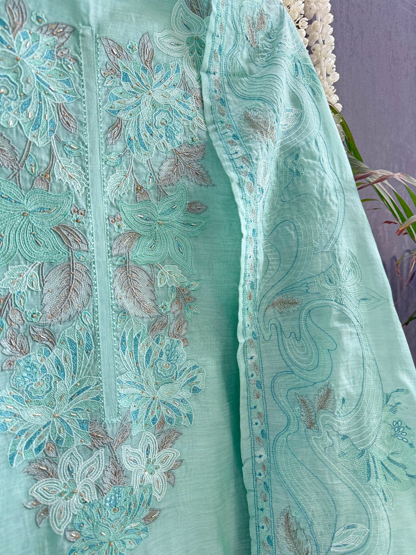 Luxurious Mul chanderi threadwork floral suit