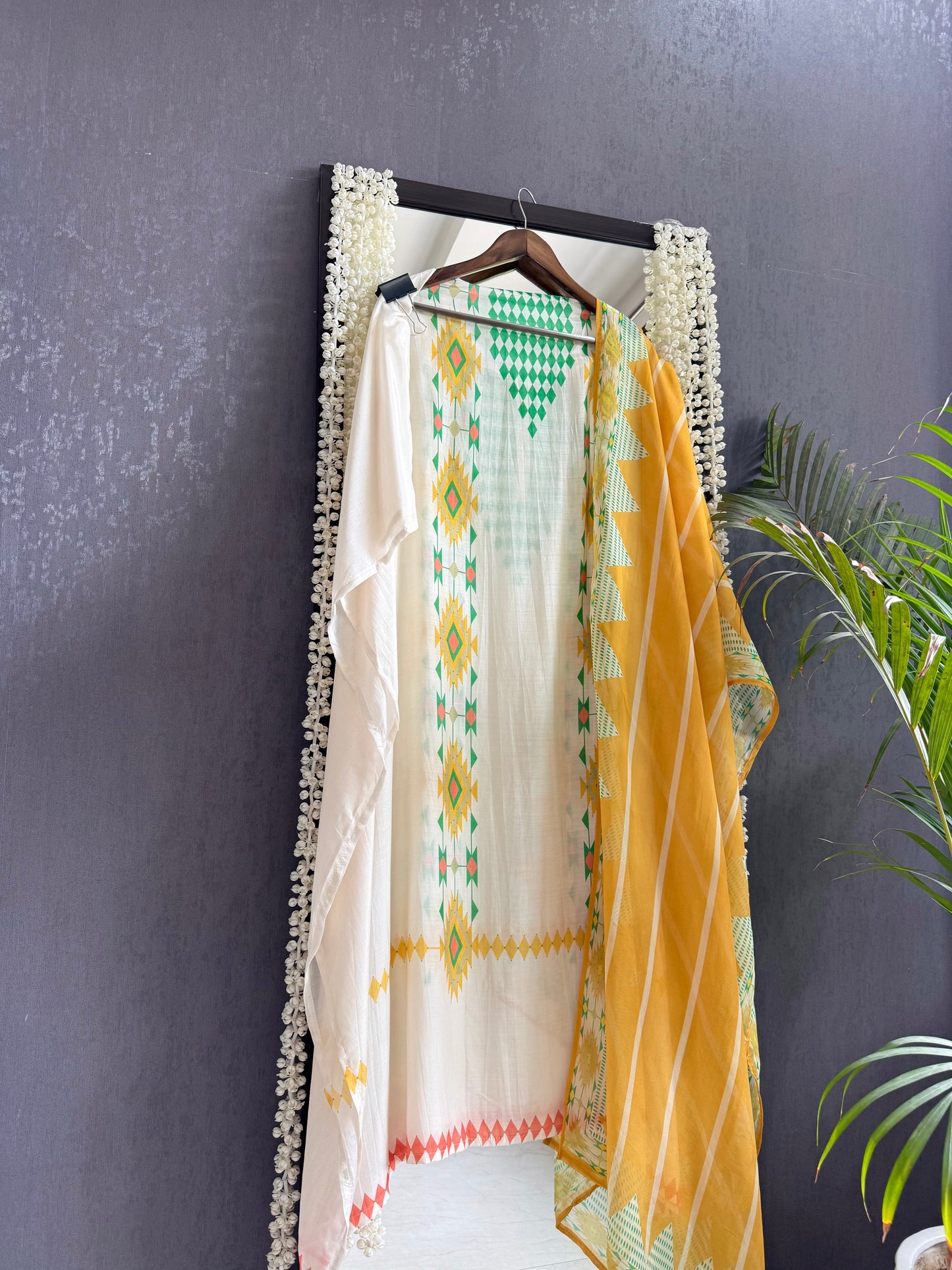 Muslin ikkat inspired handwork suits